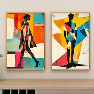 May include: Two abstract art prints with a geometric design featuring a silhouette of a person in each print. The print on the left features a person in a colorful dress walking. The print on the right features a person standing with a colorful geometric design. Both prints have a white background.