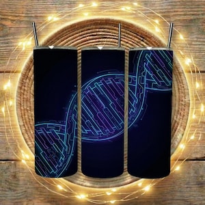 May include: Three black stainless steel tumblers with a DNA-inspired design in blue and purple. Each tumbler has a silver straw. The tumblers are arranged on a woven basket, with string lights on a wooden background.