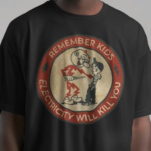Recuerde que los niños "la electricidad los matará" Camisetas gráficas, camiseta Reddy Kilowatt, sudadera Reddy Kilowatt, camiseta de dibujos animados vintage, electricidad