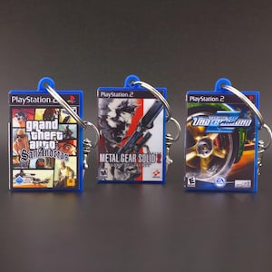 Porte-clés PS2 | Mini boîtier de jeu Playstation 2 | Cadeau de jeu rétro | Accessoire Nerd & Geek | Porte-clés fait main en résine synthétique
