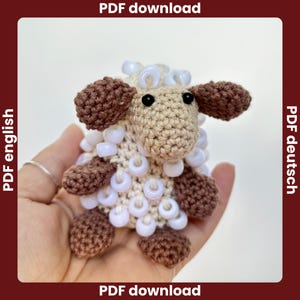deutsche Häkelanleitung Amigurumi Schaf mit Perlen, Fidget Spielzeug, Schäfchen häkeln Anleitung Anfänger, Kuscheltier Schaf häkeln, PDF