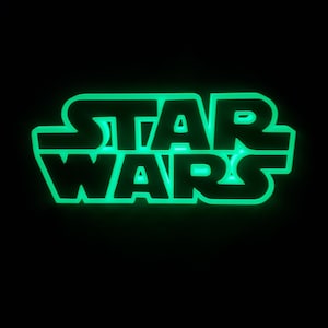 May include: A green neon sign with the text "STAR WARS" in a bold, blocky font.