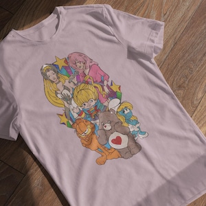 This new tee features DTF printing with a distressed, look. Soft and timeworn in style, it delivers classic nostalgia without the wait!