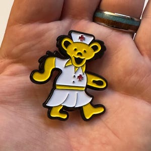 Grateful Dead Nurse Bear Pin – Limited Edition Dancing Bear Enamel Pin – Deadhead Hat Pin – Festival Collectible – Heads Merch
