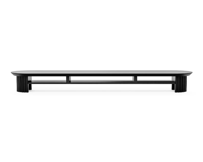 May include: A black oval coffee table with a modern design. The table has two shelves and fluted legs.