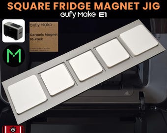 May include: A gray jig with five white square fridge magnets. The text on the image reads "SQUARE FRIDGE MAGNET JIG" and "50 x 50 mm and 57 x 57 mm". The image also includes the text "eufy Make E1" and "3D JIG SOLUTIONS".
