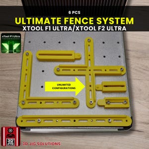 May include: A set of six yellow Ultimate Fence System components for XTool F1 Ultra and F2 Ultra laser engravers. The components are arranged on a silver metal base, with the text "ULTIMATE FENCE SYSTEM" and "UNLIMITED CONFIGURATIONS" visible.