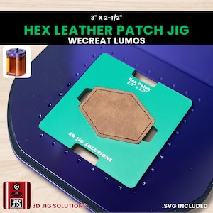 May include: A hex leather patch jig with the text "HEX LEATHER PATCH JIG" and "WECREAT LUMOS". The jig includes a brown leather patch, a green insert, and a dark blue base. The dimensions are 7.6 cm x 6.4 cm and the patch is 6.4 cm x 7.6 cm.