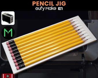 May include: A white pencil jig holding ten yellow pencils with pink erasers. The text "PENCIL JIG eufy Make E1" is displayed at the top. The image also includes the text "UP TO 200 MM" and "3D JIG SOLUTIONS .SVG INCLUDED".