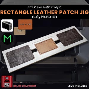 May include: A white rectangle leather patch jig with three leather patches in brown and tan. The image text reads "3" X 2" AND 3-1/2" X 2-1/2" RECTANGLE LEATHER PATCH JIG". The product is from "cufy Make E1". The dimensions are 7.6 cm x 5.1 cm and 8.9 cm x 6.4 cm.