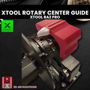 May include: XTOOL Rotary Center Guide with XTOOL RA2 PRO text. The image shows a red and white device with a gear mechanism. The XTOOL logo is in a green square. The 3D Jig Solutions logo is in the bottom left corner.