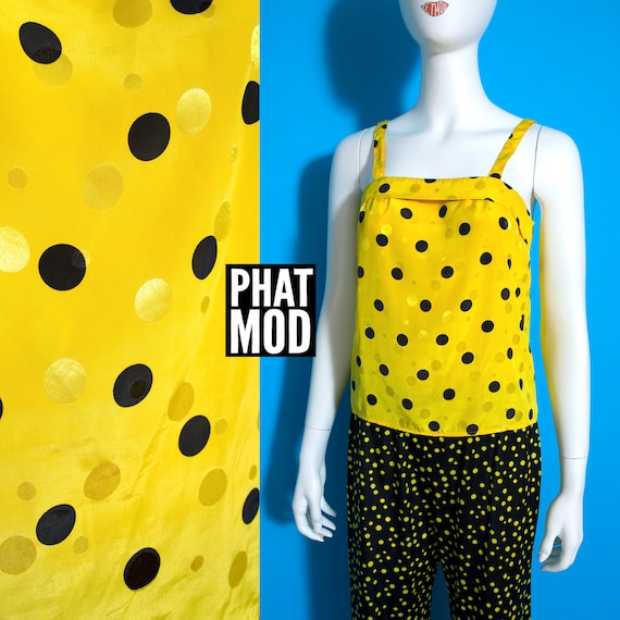 yellow top with black polka dots
