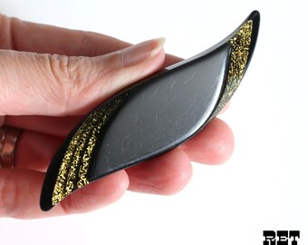 80s does the 20s Vintage Black Lucite with Gold Glitter Swoosh Shape Brooch