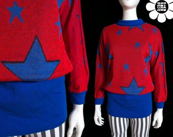 Fantástica blusa de malha vintage dos anos 70/80 com estampa de estrelas vermelhas e azuis.