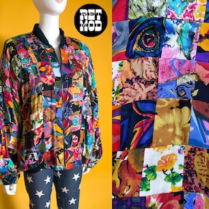May include: A colorful patchwork bomber jacket with a black collar and cuffs. The jacket features a variety of fabric patterns in shades of red, blue, yellow, and green. The jacket is displayed on a mannequin.