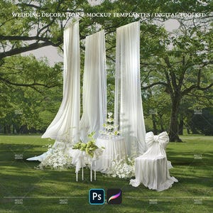 May include: A wedding decoration scene with white draping fabric, a chair with a large bow, and a table with a champagne tower. The scene is set outdoors on a green lawn with trees in the background. The text "WEDDING DECORATION" is visible.