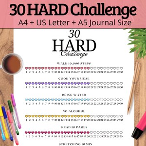 May include: A printable 30-day challenge chart with pink, purple, blue, yellow, and red hearts. The chart includes the following activities: walk 10,000 steps, cook your meal, drink water, no alcohol, read 10 pages, and stretching 10 minutes.