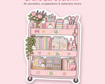Könnte beinhalten: Ein gestanzter Aufkleber mit einem dreistufigen, rosafarbenen Bastelwagen, gefüllt mit Schreibwaren wie Stiften, Washi-Tape, Notizbüchern und einer Blumenvase. Der Text lautet Craft Cart Sticker, scrap happy, cut paste create und good things take time.