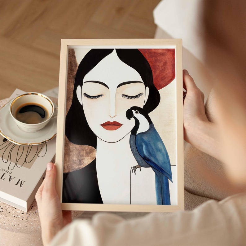 Contemporary feminine illustration featuring a calm woman in profile with eyes closed, smooth ivory-toned skin, and sleek black hair framing her face. A striking blue parrot sits delicately beside her, its detailed feathers rendered in layered shades of blue. The background carries soft earthy tones of beige and muted terracotta, enhancing the quiet emotional connection between the woman and the bird.