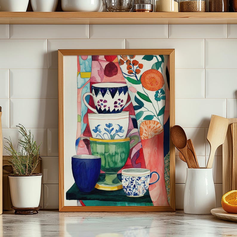 Colorful watercolor illustration of stacked teacups arranged in a playful still life. Each ceramic cup features unique floral detailing, painted with expressive textures. The surrounding abstract background includes botanical forms and layered colors, evoking a cozy and creative kitchen atmosphere.