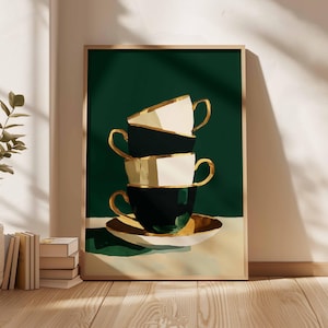 May include: An art print showing a stack of four teacups. The cups alternate between black and cream, with gold handles and trim. The background is a deep green, and the artwork is set on a white surface.
