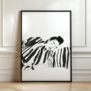 Puede incluir: Ilustración en blanco y negro de línea de arte de una persona durmiendo sobre una almohada a rayas. La persona está acostada de lado con la cabeza apoyada en la almohada. La ilustración es de estilo minimalista.