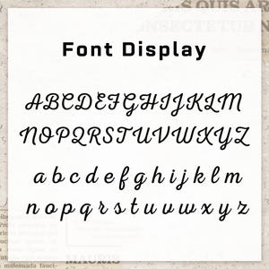 May include: A white background displays the text "Font Display" in black, above the alphabet in uppercase and lowercase, showcasing a cursive font style. The letters are in black.