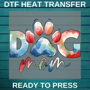 May include: A watercolor design of a paw print with the letters "DOG" on either side and the word "mom" underneath. The design is in shades of blue, red, green, and orange. The text "READY TO PRESS" is at the bottom of the image.
