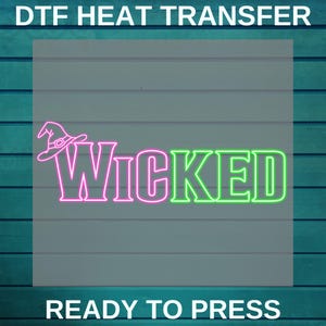 May include: A neon-style graphic with the word "WICKED" in pink and green, featuring a witch hat above the word "WICKED". The text "READY TO PRESS" is at the bottom. The background is a light gray with a teal wood grain.