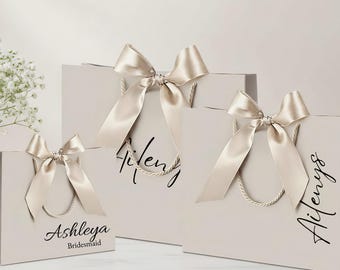 Bolsas de regalo de champán personalizadas para bodas, regalos de fiesta con lazo de cinta, bolsas de regalo para damas de honor, bolsas de regalo navideñas con nombre personalizado para regalos festivos.