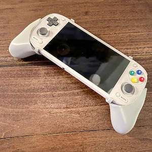 Dual Retroid Pocket 5 für Bildschirmschutz angepasste Griffe - Beinhaltet einen Stiftclip auf der Rückseite, der als Ständer fungiert - Einfache Entfernung