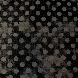 May include: A dark, textured background with a pattern of evenly spaced, light gray polka dots. The background has a distressed, grunge-like appearance with subtle variations in color and texture, creating a vintage aesthetic.