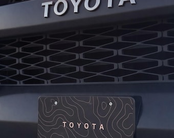 Placa de aluminio para vanidad de Toyota, diseño topográfico, decoración para coche