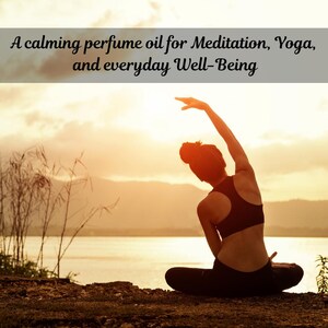 May include: A woman in a black sports bra and leggings stretches during yoga at sunset. The text at the top reads, "A calming perfume oil for Meditation, Yoga, and everyday Well-Being."