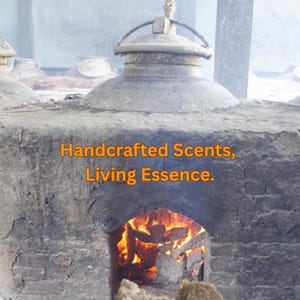 May include: A stone structure with a domed top and a metal handle. The structure has the text "Handcrafted Scents, Living Essence." A fire burns in the lower section of the structure, with flames visible. The overall theme is related to scent production.