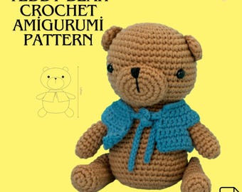 May include: Crochet amigurumi teddy bear pattern in PDF format. The pattern includes instructions for making a brown teddy bear with a blue jacket. The bear is sitting on a yellow background.