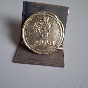 Brass saab logo coin
