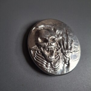 pewter skeleton medallion