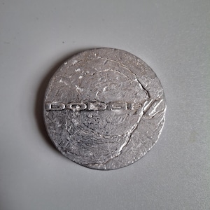 Pièce de monnaie avec logo d&#39;esquive en plomb