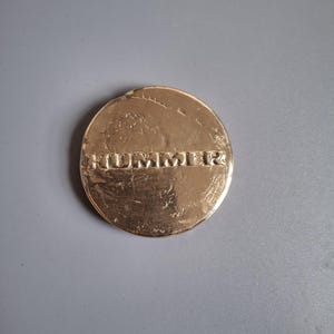 Aluminum bronze Hummer logo medallion
