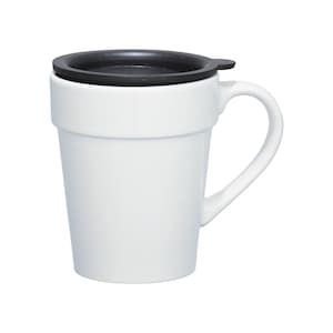 May include: A white ceramic mug with a black lid. The mug has a handle and a cylindrical shape with a slightly flared top. The lid fits snugly on the mug, suggesting it's designed to keep beverages warm.