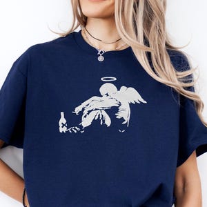 Banksy Fallen Angel Shirt, Street Art Graffiti Graphic Tee, Urban Art T-Shirt, Banksy Inspired Gift Unisex, Unisex Cartoon Anime Top Tee