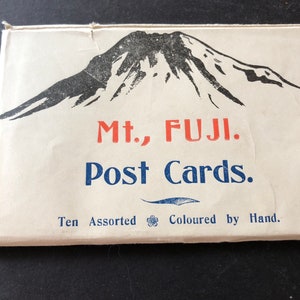 Juego de 10 postales del monte Fuji coloreadas a mano En perfecto estado Nunca publicado con sobre original Recuerdo histórico de Japón de 1920.