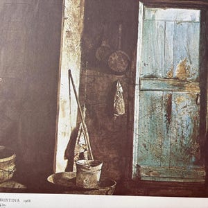 May include: A watercolour painting depicting a rustic interior with a wooden door, two buckets, and a broom. The door is painted a light blue with a weathered finish. The buckets are made of wood and are painted a dark brown. The broom is made of straw and has a wooden handle.