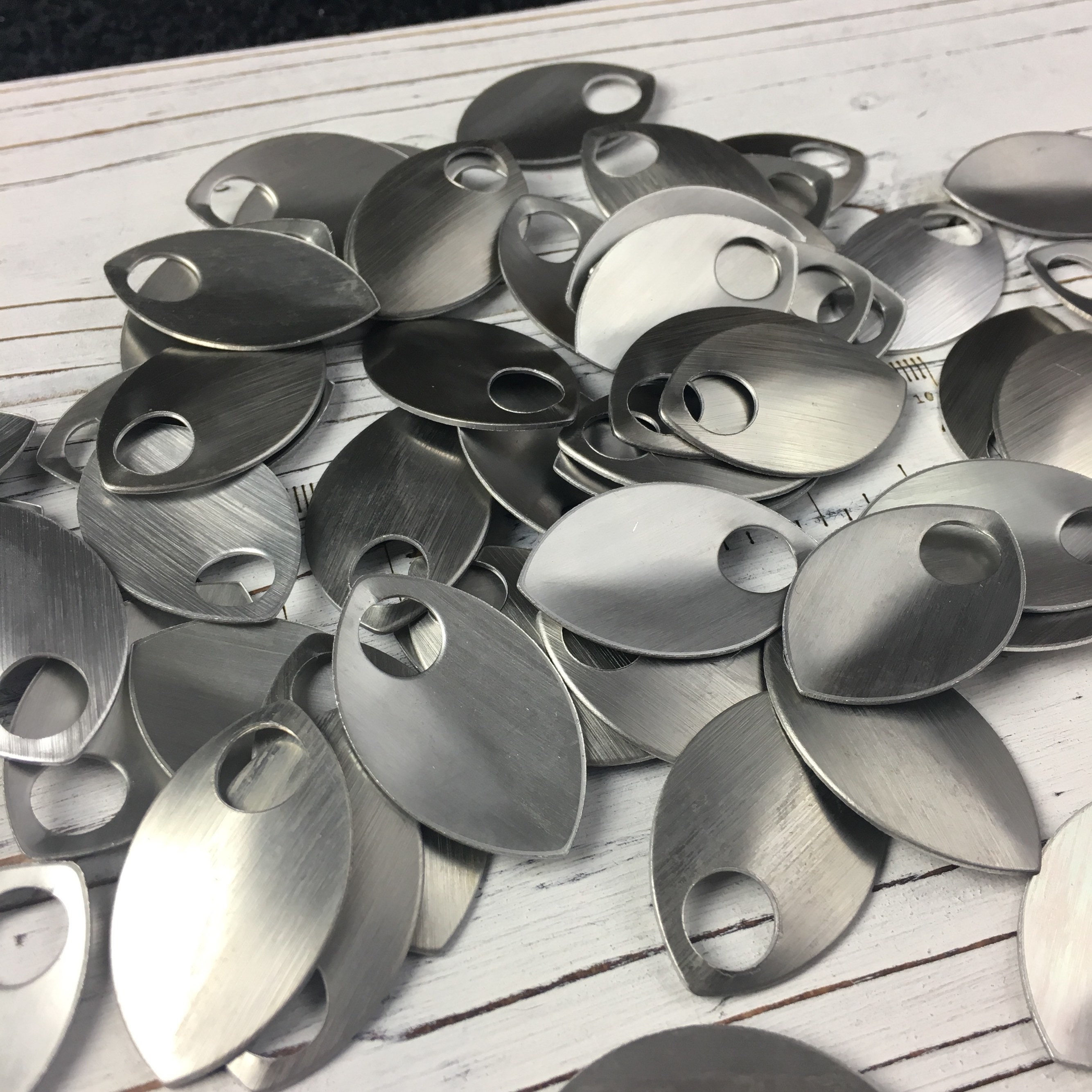 Large bronze color anodized aluminum scales for Scalemaille and Chainmaille