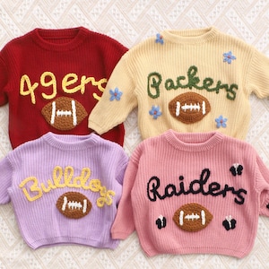 Personalized Sweater with Football, Custom Name Football Sweatshirt, Hand-Embroidered Sports Sweater, Skol Sweater, Toddler Football Sweater 4.8 (747) By PenbabyStudio Made by PenbabyStudio Shop owned by HyunChul 1 year on Etsy