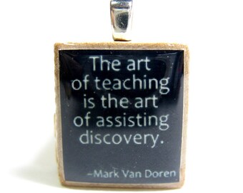 The art of teaching is the art of assisting discovery - black Scrabble tile teacher gift