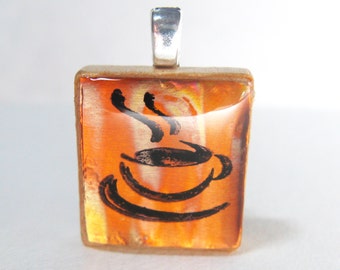 Cup o'joe - Orange glowing copper Scrabble tile pendant with coffee cup