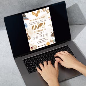 May include: A laptop displaying a birthday invitation with a magical theme. The invitation reads "Harry is turning 13" with illustrations of a hat, owl, and other magical elements. The date is October 15th.
