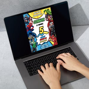 May include: A laptop displays a colorful birthday invitation featuring various superheroes. The invitation reads "Calling All Superheroes! Connor is turning 5" with event details. The laptop is open, and hands are typing on the keyboard.